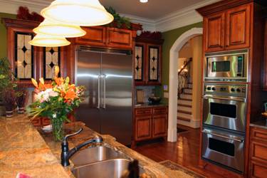 classic look custom kitchen remodel with stain glass cabinet fronts image 6